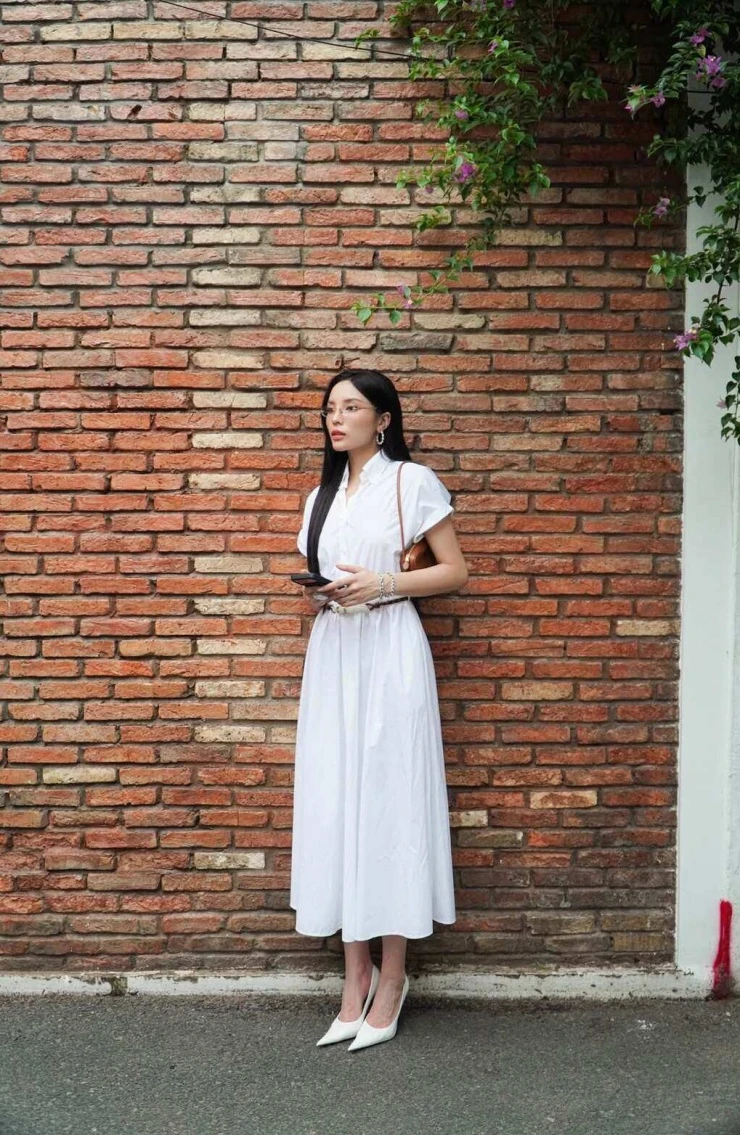 Ảnh sao 3/7: Mỹ Tâm gây thương nhớ với áo dài trắng