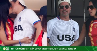 Brad Pitt hôn bạn gái trên khán đài World Cup