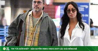 Brad Pitt nắm chặt tay bạn gái ở sân bay