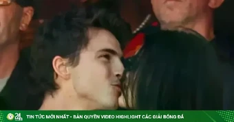 Chàng thơ nước Pháp hôn bạn gái trên khán đài chung kết World Cup