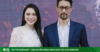 Johnny Trí Nguyễn bảnh bao đi thảm đỏ dưới mưa