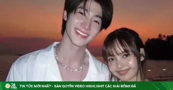 Lisa khoác tay chàng trai Thái trên phố
